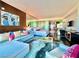 Bright living room featuring modern furniture and a large abstract art piece at 4381 W Flamingo Rd # 12304, Las Vegas, NV 89103