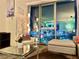 Inviting living room featuring comfortable seating, modern lighting, and a scenic city view at 4381 W Flamingo Rd # 12304, Las Vegas, NV 89103