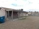 Spacious backyard featuring a covered patio and gravel landscaping at 4601 Diamond Head Dr, Las Vegas, NV 89110