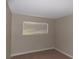 Neutral bedroom with neutral carpet and a bright window at 4601 Diamond Head Dr, Las Vegas, NV 89110