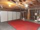 Spacious garage with unfinished walls and ceiling and insulated doors at 4601 Diamond Head Dr, Las Vegas, NV 89110