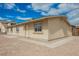 Charming single-story home with a neutral exterior, well-maintained landscaping, and a welcoming entrance at 4790 E Cleveland Ave, Las Vegas, NV 89104