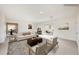 Bright, airy living room with neutral tones, stylish furniture, and sliding glass doors to outdoor space at 4790 E Cleveland Ave, Las Vegas, NV 89104