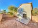 Back yard featuring a patio, trees, and block wall at 4823 Jubilee Diamond Ct, Las Vegas, NV 89139