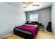 This bedroom has a ceiling fan and window for natural light at 5040 Copperlyn St, Las Vegas, NV 89122