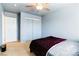Bedroom features a ceiling fan, and double door closet at 5040 Copperlyn St, Las Vegas, NV 89122