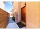 Charming entryway leads to front door with nice stonework and a walkway at 5040 Copperlyn St, Las Vegas, NV 89122
