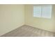 Carpeted bedroom has neutral walls and blinds on the window at 5406 Indigo Hills St, North Las Vegas, NV 89031