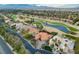 The property is an aerial view, surrounded by a golf course and trees at 60 Innisbrook Ave, Las Vegas, NV 89113