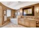 Elegant bathroom with a soaking tub, dual vanity sinks, and a large framed mirror at 60 Innisbrook Ave, Las Vegas, NV 89113