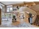 Grand foyer featuring a winding staircase, soaring ceilings, and an open-concept layout at 60 Innisbrook Ave, Las Vegas, NV 89113