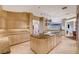 Bright kitchen featuring a center island, granite countertops, and sleek appliances in an open floor plan at 60 Innisbrook Ave, Las Vegas, NV 89113