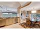 Bright, modern kitchen with stainless steel appliances and dining area at 60 Innisbrook Ave, Las Vegas, NV 89113