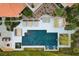 Aerial shot of the backyard pool, lounge chairs, and cabana at 60 Innisbrook Ave, Las Vegas, NV 89113