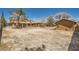 Expansive backyard offering endless possibilities, complete with a covered patio and potential for landscaping at 6151 Whispering Sands Dr, Las Vegas, NV 89131