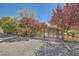 Wide driveway with ornate iron gate, providing privacy and security for the residence at 6151 Whispering Sands Dr, Las Vegas, NV 89131