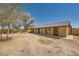 View of the horse barn showing stalls and ample outdoor space for horses and related activities at 6151 Whispering Sands Dr, Las Vegas, NV 89131