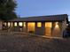 Illuminated horse barn stalls with lights and classic design, featuring ample space for horses at 6151 Whispering Sands Dr, Las Vegas, NV 89131