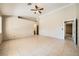 Spacious living room with high ceilings and neutral walls, creating a blank canvas for personalization at 6151 Whispering Sands Dr, Las Vegas, NV 89131