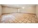 Spacious living room featuring unique tiled flooring and ample room for furniture at 6151 Whispering Sands Dr, Las Vegas, NV 89131