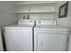 Convenient laundry area with washer and dryer at 6174 Meadowgrass Ln, Las Vegas, NV 89103