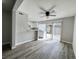 Bright and airy living room featuring an open floor plan and plenty of natural light at 6174 Meadowgrass Ln, Las Vegas, NV 89103