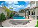 Stunning backyard pool with spa, fire pit, and covered patio, perfect for outdoor living at 6655 Tranquil Seas Ct, Las Vegas, NV 89139
