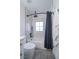 This bathroom features a modern shower, tub combo, and updated tiling at 6655 Tranquil Seas Ct, Las Vegas, NV 89139