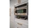 Close up of a modern built-in oven and cabinet with stylish hardware, showcasing sleek design at 6655 Tranquil Seas Ct, Las Vegas, NV 89139