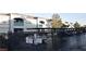 Exterior view of the apartment building, showcasing the gated community and well-kept landscaping at 6955 N Durango Dr # 2107, Las Vegas, NV 89149