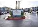 The Regent at Town Center sign with landscaping and views of the apartment community in the background at 6955 N Durango Dr # 2107, Las Vegas, NV 89149