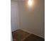 Hallway with door and neutral walls and floor at 6955 N Durango Dr # 2107, Las Vegas, NV 89149