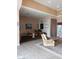 Spacious community lounge with tile floors and comfortable seating areas at 6955 N Durango Dr # 2107, Las Vegas, NV 89149