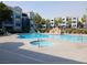 Resort-style pool area with a waterfall feature and spa at 6955 N Durango Dr # 2107, Las Vegas, NV 89149