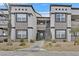 Inviting exterior view of a multi-story home featuring well-maintained landscaping and contemporary architectural details at 7255 W Sunset Rd # 1090, Las Vegas, NV 89113