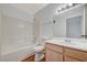 This bathroom features a sink, toilet, and bathtub with tile surround at 7885 W Flamingo Rd # 2012, Las Vegas, NV 89147