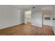 An unfurnished bedroom with new floors features a walk in closet with an open door at 7885 W Flamingo Rd # 2012, Las Vegas, NV 89147