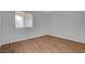 A well-lit bedroom featuring new flooring, fresh paint, and a window offering lots of natural light at 7885 W Flamingo Rd # 2012, Las Vegas, NV 89147