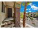 Close-up of a well-kept building entrance with greenery and desert landscaping at 7885 W Flamingo Rd # 2012, Las Vegas, NV 89147