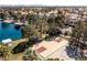 Enjoy a community basketball court with lake view and shaded picnic area for outdoor activities at 8433 Honeywood Cir, Las Vegas, NV 89128