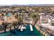 Aerial view of community amenities, including paddle boats and lake access, surrounded by lush landscaping at 8433 Honeywood Cir, Las Vegas, NV 89128