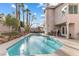 Backyard showcases a private pool and patio with furniture at 8433 Honeywood Cir, Las Vegas, NV 89128
