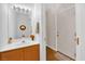 A bright bathroom features a well-lit vanity, adding a touch of elegance and functionality at 8512 Porch Rocker St, Las Vegas, NV 89143