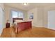 Bright bedroom with a wooden sleigh bed and a large window at 8512 Porch Rocker St, Las Vegas, NV 89143