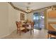 Kitchen nook area with tile floors and backyard access at 8512 Porch Rocker St, Las Vegas, NV 89143