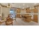 Eat in kitchen with tile floors, stainless appliances, and dining area at 8512 Porch Rocker St, Las Vegas, NV 89143