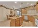 Kitchen with a central island, and stainless steel appliances at 8512 Porch Rocker St, Las Vegas, NV 89143