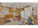 Kitchen with island, tile floors, and stainless steel appliances at 8512 Porch Rocker St, Las Vegas, NV 89143