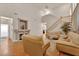 Inviting living room featuring a fireplace, high ceilings, and ample natural light at 8512 Porch Rocker St, Las Vegas, NV 89143