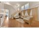 Open concept living room with high ceilings, and hardwood floors at 8512 Porch Rocker St, Las Vegas, NV 89143